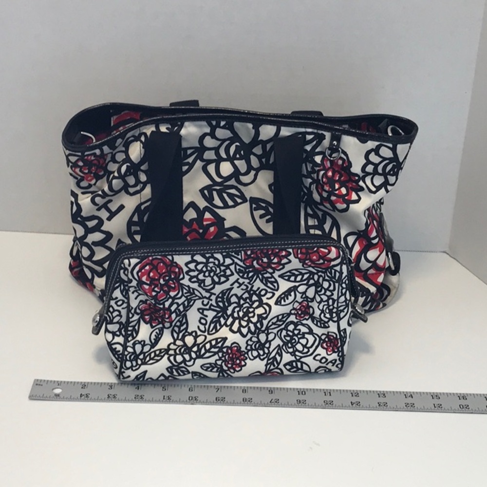 Women’s Coach satchel w/ makeup bag